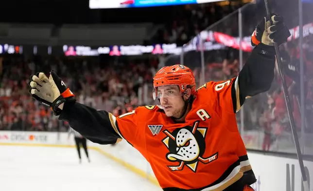 Anaheim Ducks center Leo Carlsson celebrates his empty net goal during the third period of Game 6 in the first round of the NHL hockey Stanley Cup playoffs series against the Edmonton Oilers, Thursday, April 30, 2026, in Anaheim, Calif. (AP Photo/Mark J. Terrill)
