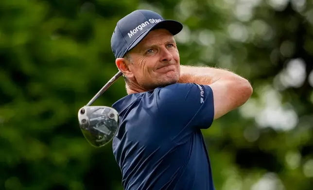 Justin Rose, of England, hits from the 16th tee during second round of the Truist Championship golf tournament at the Quail Hollow Club, Friday, May 8, 2026, in Charlotte, N.C. (AP Photo/Chris Carlson)