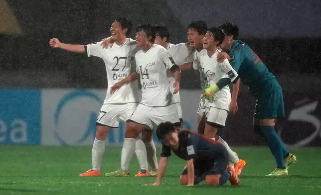 North Korea's Naegohyang Women's FC players celebrate after defeating South Korea's Suwon FC in their AFC Women's Champions League semifinal match in Suwon, South Korea, Wednesday, May 20, 2026. (AP Photo/Lee Jin-man)