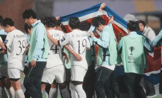 North Korea's Naegohyang Women's FC players celebrate after defeating South Korea's Suwon FC in their AFC Women's Champions League semifinal match in Suwon, South Korea, Wednesday, May 20, 2026. (AP Photo/Lee Jin-man)