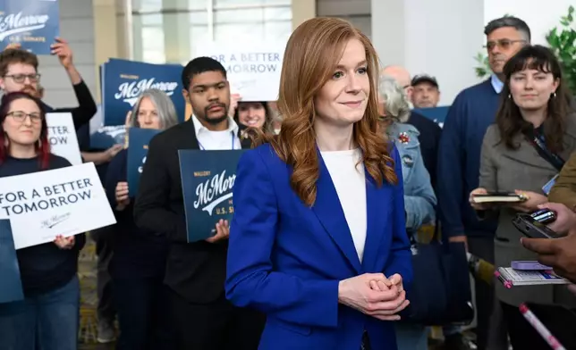 Michigan State Sen. Mallory McMorrow, D-Royal Oak, a candidate for the U.S. Senate, listens to questions from the media during the Michigan Democratic Party State Endorsement Convention, Sunday, April 19, 2026, in Detroit. (AP Photo/Jose Juarez)