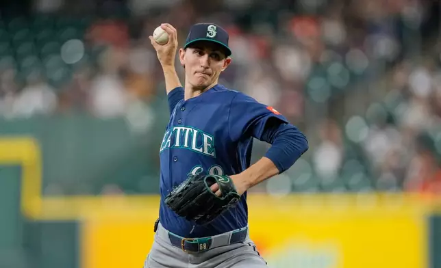 Seattle Mariners starting pitcher George Kirby throws against the Houston Astros during the first inning of a baseball game Monday, May 11, 2026, in Houston. (AP Photo/David J. Phillip)