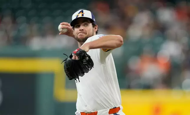 Houston Astros starting pitcher Peter Lambert (38) throws against the Seattle Mariners during the first inning of a baseball game Monday, May 11, 2026, in Houston. (AP Photo/David J. Phillip)