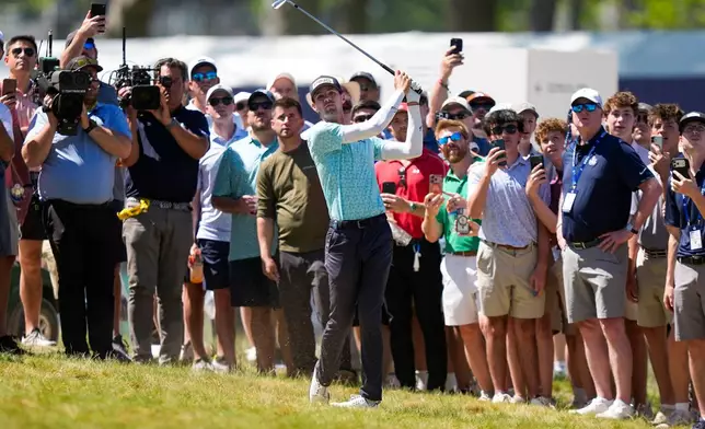 Alex Smalley hits from the first fairway during the third round of the PGA Championship golf tournament at Aronimink Golf Club, Saturday, May 16, 2026, in Newtown Square, PA. (AP Photo/Matt Slocum)