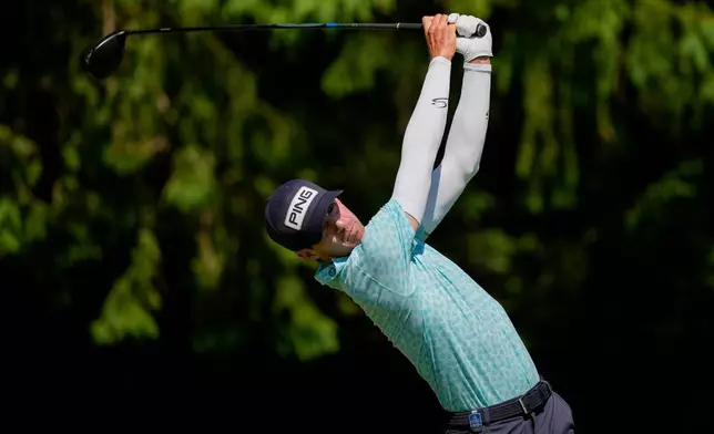 Alex Smalley hits from the fourth tee during the third round of the PGA Championship golf tournament at Aronimink Golf Club, Saturday, May 16, 2026, in Newtown Square, PA. (AP Photo/Carolyn Kaster)