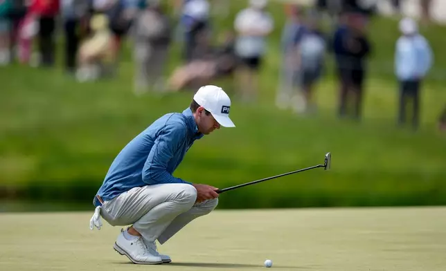 Alex Smalley lines up his shot on the 17th green during the second round of the PGA Championship golf tournament at Aronimink Golf Club, Friday, May 15, 2026, in Newtown Square, PA. (AP Photo/Matt Slocum)