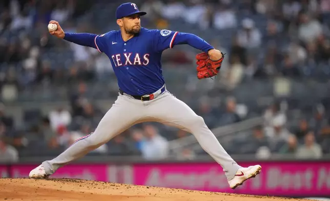 Texas Rangers' Nathan Eovaldi pitches during the first inning of a baseball game against the New York Yankees, Wednesday, May 6, 2026, in New York. (AP Photo/Frank Franklin II)