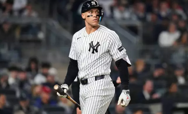 New York Yankees' Aaron Judge reacts after striking out during the fourth inning of a baseball game against the Texas Rangers Wednesday, May 6, 2026, in New York. (AP Photo/Frank Franklin II)