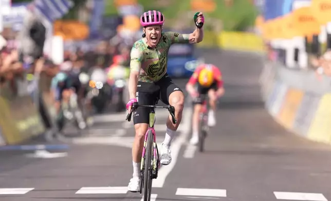 Denmark's Michael Valgren celebrates winning the 17th stage of the Giro d'Italia cycling race from Cassano D'Adda to Andalo, Italy, Wednesday, May 27, 2026. (Gianmattia D'Albertoi/LaPresse via AP)