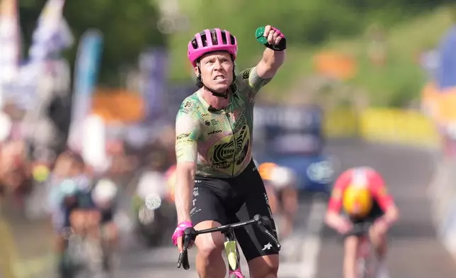 Denmark's Michael Valgren celebrates winning the 17th stage of the Giro d'Italia cycling race from Cassano D'Adda to Andalo, Italy, Wednesday, May 27, 2026. (Gianmattia D'Albertoi/LaPresse via AP)
