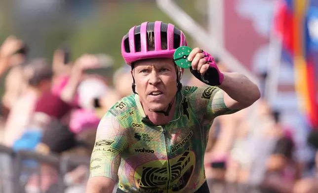 Denmark's Michael Valgren celebrates winning the 17th stage of the Giro d'Italia cycling race from Cassano D'Adda to Andalo, Italy, Wednesday, May 27, 2026. (Gianmattia D'Albertoi/LaPresse via AP)