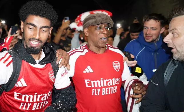 Former Arsenal player Ian Wright arrives at the Arsenal stadium to celebrate with supporters after Arsenal's soccer team won the Premier League title in London, Tuesday, May 19, 2026.(AP Photo/Alberto Pezzali)