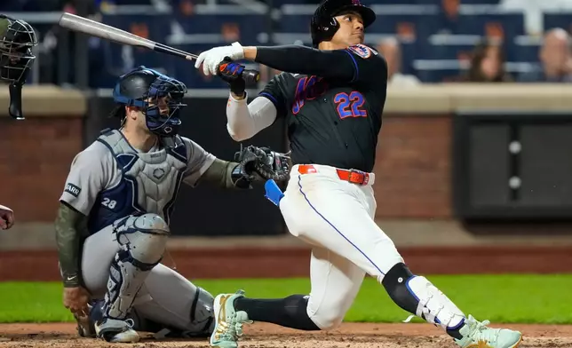 New York Mets' Juan Soto (22) hits a home run during the seventh inning of a baseball game against the New York Yankees, Friday, May 15, 2026, in New York. (AP Photo/Yuki Iwamura)