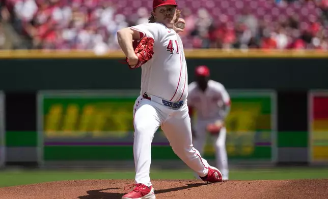 Cincinnati Reds pitcher Andrew Abbott delivers during the first inning of a baseball game against the Houston Astros, Sunday, May 10, 2026, in Cincinnati. (AP Photo/Kareem Elgazzar)