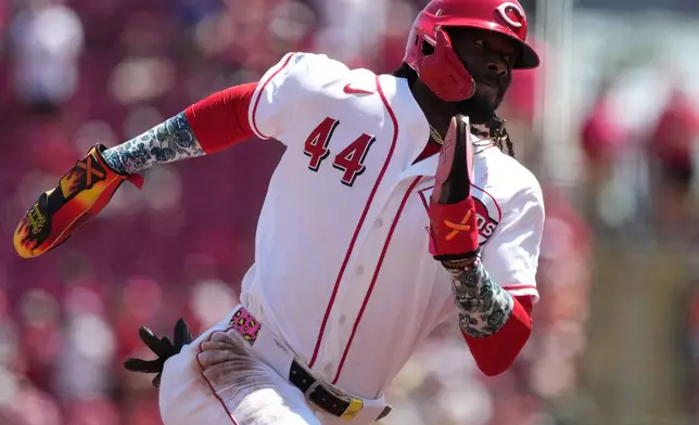 Cincinnati Reds' Elly de la Cruz advances to third base on a double by teammate Sal Stewart during the fourth inning of a baseball game against the Houston Astros, Sunday, May 10, 2026, in Cincinnati. (AP Photo/Kareem Elgazzar)