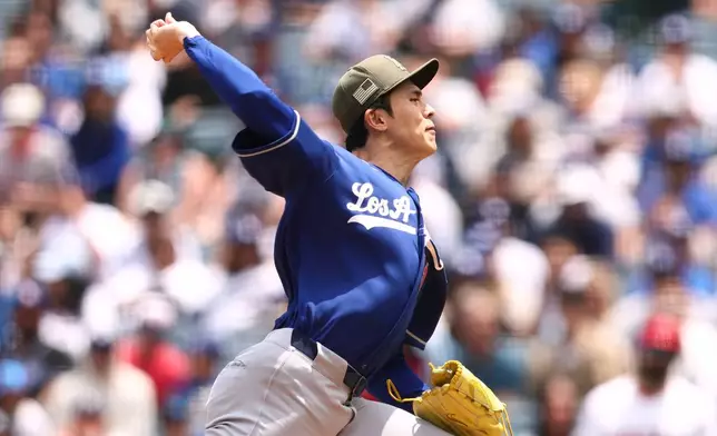 Los Angeles Dodgers pitcher Roki Sasaki throws to a Los Angeles Angels batter during the first inning of a baseball game, Sunday, May 17, 2026, in Anaheim, Calif. (AP Photo/Jessie Alcheh)