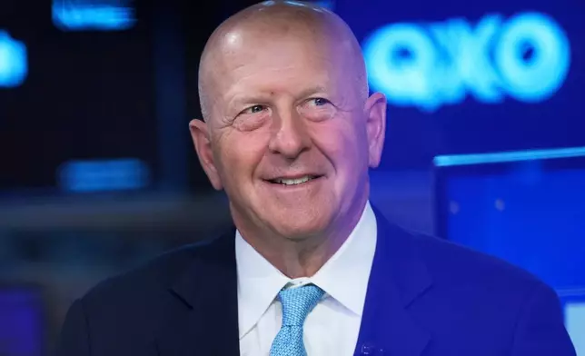 FILE - Goldman Sachs CEO David Solomon is interviewed on the floor of the New York Stock Exchange in New York, Wednesday, July 16, 2025. (AP Photo/Seth Wenig, File)