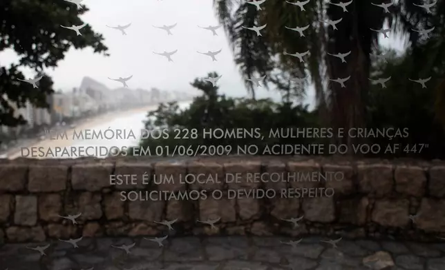 A message in Portuguese reads: "In memory of the 228 men, women and children who disappeared on 01/06/2009 in the crash of flight AF 447. This is a place of remembrance, we request due respect," on a memorial in Rio de Janeiro, Brazil, honoring the passengers who died in the crash near the coast, Thursday, May 21, 2026. (Photo AP/Bruna Prado)