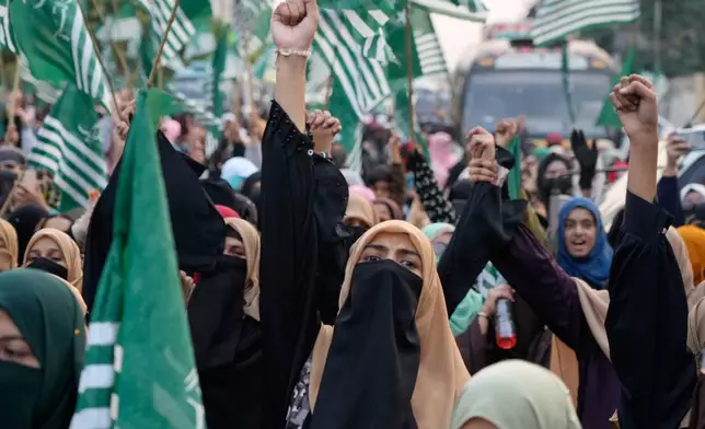 Supporters of ' Muslim women league Pakistan, hold a rally to mark the anniversary of last year's four-day conflict with neighboring India, Thursday, May 7, 2026, in Lahore, Pakistan. (AP Photo/K.M. Chaudary)