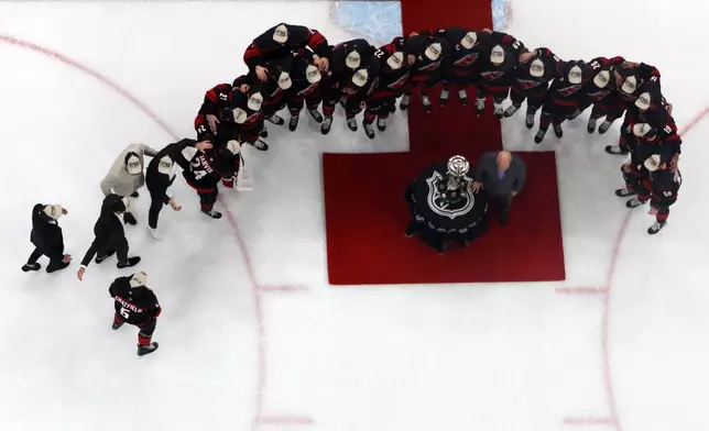 The Carolina Hurricanes accept the Prince of Wales Trophy following Game 5 of the Eastern Conference finals NHL hockey Stanley Cup playoff series against the Montreal Canadiens in Raleigh, N.C., Friday, May 29, 2026. (AP Photo/Karl DeBlaker)