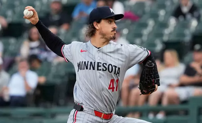 Minnesota Twins starting pitcher Joe Ryan throws against the Chicago White Sox during the first inning of a baseball game in Chicago, Tuesday, May 26, 2026. (AP Photo/Nam Y. Huh)