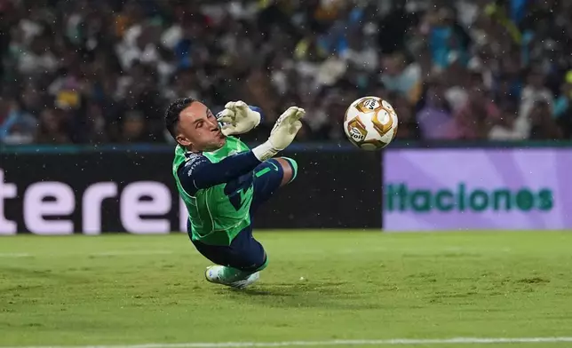 Pumas' goalkeeper Keylor Navas makes a save against Cruz Azul during the Mexican soccer league second leg final match in Mexico City, Sunday, May 24, 2026. (AP Photo/Eduardo Verdugo)