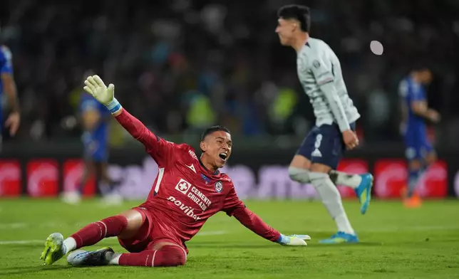 Cruz Azul's goalkeeper Kevin Mier celebrates after beating Pumas during the Mexican soccer league second leg final match in Mexico City, Sunday, May 24, 2026. (AP Photo/Fernando Llano)