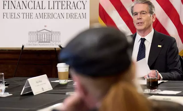 Treasury Secretary Scott Bessent speaks with members of the Association of Mature American Citizens (AMAC), about financial literacy, Wednesday, April 29, 2026, at the Treasury Department, in Washington. (AP Photo/Jacquelyn Martin)