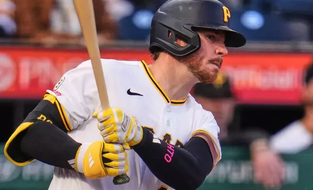 Pittsburgh Pirates' Ryan O'Hearn doubles off Colorado Rockies pitcher Jose Quintana during the second inning of a baseball game in Pittsburgh, Wednesday, May 13, 2026. (AP Photo/Gene J. Puskar)