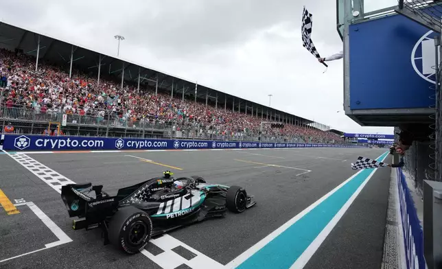 Mercedes driver Kimi Antonelli of Italy finishes first in the Miami Formula One Grand Prix auto race, Sunday, May 3, 2026, in Miami Gardens, Fla. (AP Photo/Rebecca Blackwell, Pool)