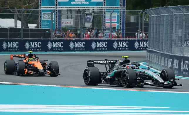 Mercedes driver Kimi Antonelli, right, of Italy and McLaren driver Lando Norris of Britain steer their cars during the Miami Formula One Grand Prix auto race, Sunday, May 3, 2026, in Miami Gardens, Fla. (AP Photo/Marta Lavandier)