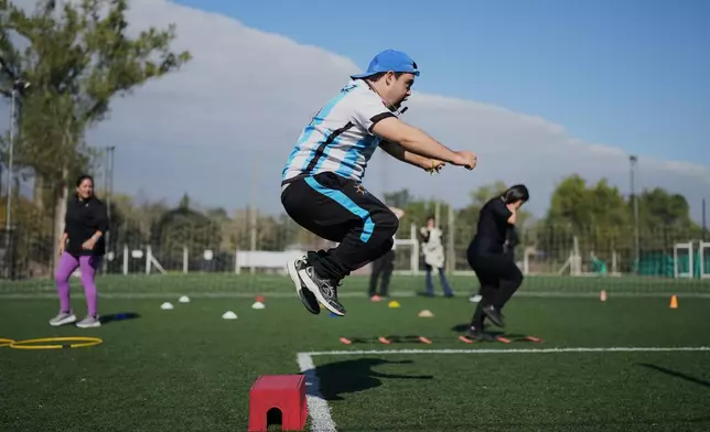 Ramito Fardelli exercises at a nonprofit center that supports people with disabilities, in Moreno on the outskirts of Buenos Aires, Argentina, Tuesday, May 5, 2026. (AP Photo/Natacha Pisarenko)