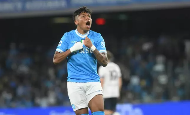 Napoli's Alisson Santos celebrates scoring during the Italian Serie A soccer match between Napoli and Bologna in Naples, Italy, Monday, May 11, 2026. (Alessandro Garofalo/LaPresse via AP)