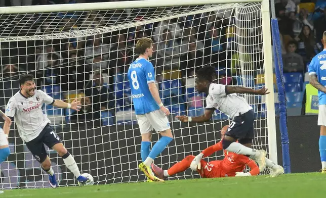 Bologna's Jonathan Rowe celebrates after scoring during the Italian Serie A soccer match between Napoli and Bologna in Naples, Italy, Monday, May 11, 2026. (Alessandro Garofalo/LaPresse via AP)