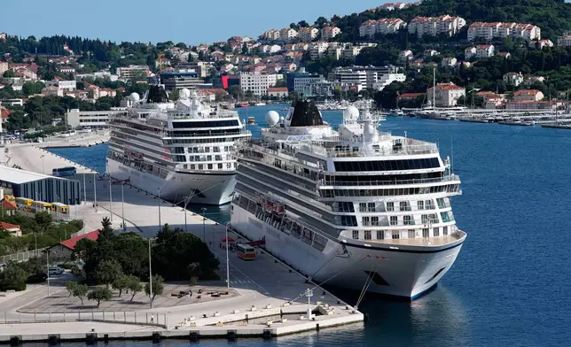 Cruise ships are moored in the port of Dubrovnik, Croatia, Wednesday, April 29, 2026. (AP Photo/Darko Bandic)