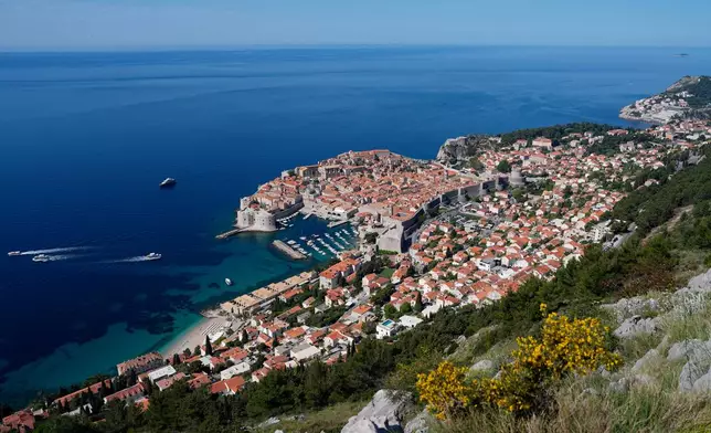 Old town of Dubrovnik, Croatia, lines the shore of the Adriatic Sea, Monday, April 27, 2026. (AP Photo/Darko Bandic)