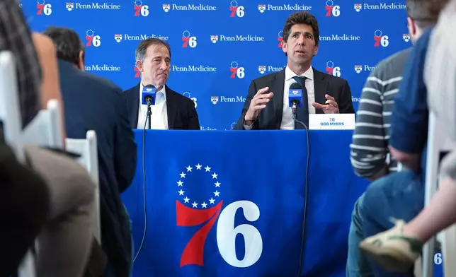 Philadelphia 76ers Managing Partner Josh Harris, left, and Bob Myers, President of Sports for Harris Blitzer Sports &amp; Entertainment, take part in a news conference at the NBA basketball team's practice facility in Camden, N.J., Thursday, May 14, 2026. (AP Photo/Matt Rourke)