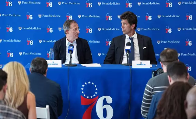 Philadelphia 76ers Managing Partner Josh Harris, left, and Bob Myers, President of Sports for Harris Blitzer Sports &amp; Entertainment, take part in a news conference at the NBA basketball team's practice facility in Camden, N.J., Thursday, May 14, 2026. (AP Photo/Matt Rourke)