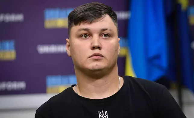 FILE - Russian defector Maksim Kuzminov attends a news conference in Kyiv, Ukraine, Sept. 5, 2023. (AP Photo/Vladyslav Musiienko, File)
