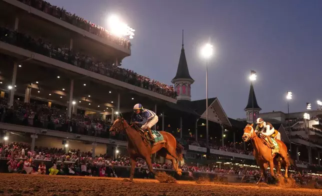 Always a Runner, left, ridden by Jose L. Ortiz wins the 152nd running of the Kentucky Oaks horse race at Churchill Downs, Friday, May 1, 2026, in Louisville, Ky. (AP Photo/Abbie Parr)