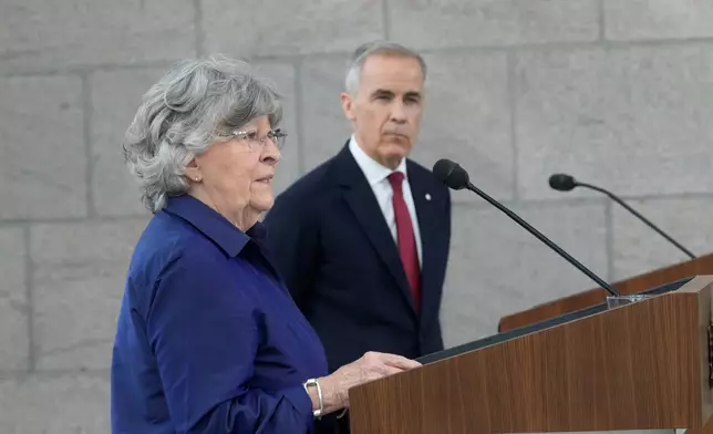 Canada Prime Minister Mark Carney and Louise Arbour take part in an announcement in Ottawa on Tuesday, May 5, 2026. (Adrian Wyld/The Canadian Press via AP)