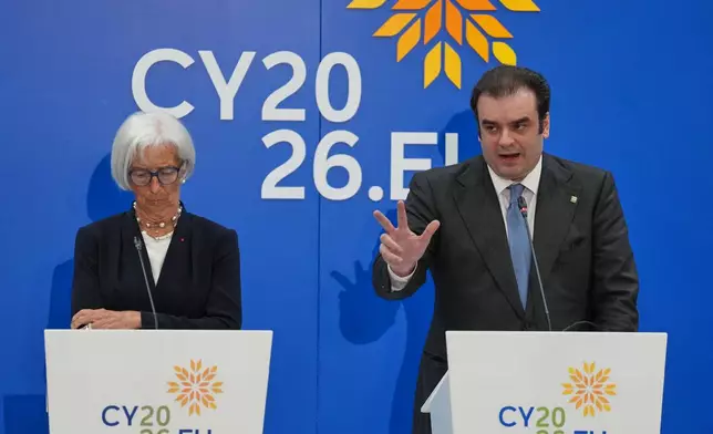 European Central Bank President Christine Lagarde, left, and President of the Eurogroup Kyriakos Pierrakakis talk to the media during the Eurogroup finance ministers meeting in capital Nicosia, Cyprus, Friday, May 22, 2026. (AP Photo/Petros Karadjias)