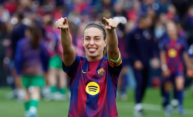 Barcelona's Alexia Putellas gestures towards the fans at the end of the women's Champions League semifinal soccer match between FC Barcelona and FC Bayern Munich in Barcelona, Spain, Sunday, May 3, 2026. (AP Photo/Joan Monfort)
