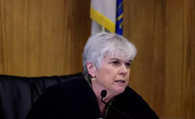 Judge Jeanmarie Carroll questions potential jurors as the assault trial of Stefon Diggs begins in Dedham, Mass., Monday May 4, 2026. (Pat Greenhouse/The Boston Globe via AP, Pool)