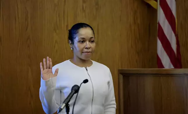 Stefon Diggs' former personal chef Jamila Adams is sworn in before giving testimony in Dedham District Court in Dedham, Mass., Monday May 4, 2026. (Pat Greenhouse/The Boston Globe via AP, Pool)