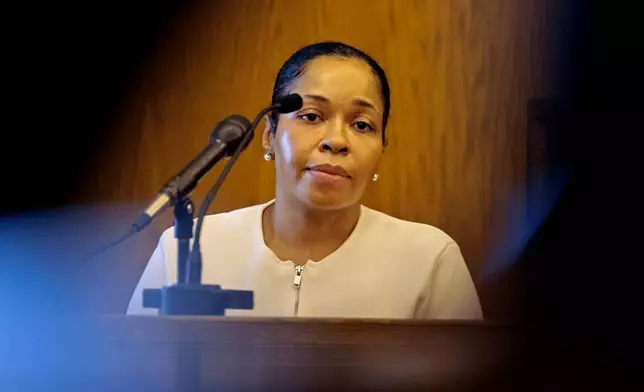 Stefon Diggs' former personal chef, Jamila Adams, is questioned by Assistant District Attorney Drew Virtue in Dedham District Court in Dedham, Mass., Monday May 4, 2026. (Pat Greenhouse/The Boston Globe via AP, Pool)