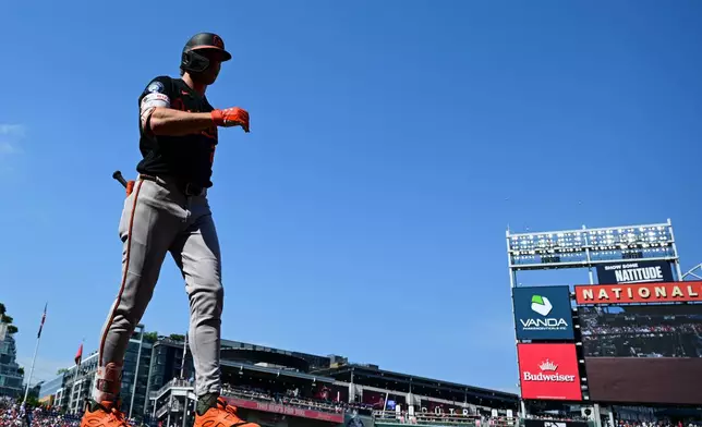 Baltimore Orioles' Gunnar Henderson walks to the on-deck circle during the first inning of a baseball game against the Washington Nationals, Saturday, May 16, 2026, in Washington. (AP Photo/Terrance Williams)