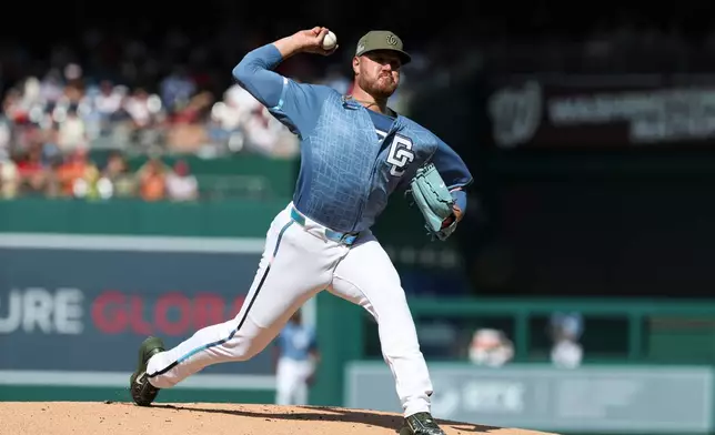 Washington Nationals pitcher Cade Cavalli throws during the first inning of a baseball game against the Baltimore Orioles, Saturday, May 16, 2026, in Washington. (AP Photo/Terrance Williams)