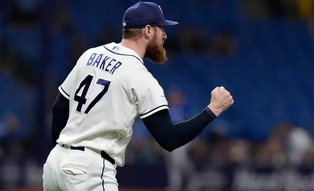 Tampa Bay Rays pitcher Bryan Baker (47) reacts after closing out the Toronto Blue Jays during a baseball game Monday, May 4, 2026, in St. Petersburg, Fla. (AP Photo/Chris O'Meara)