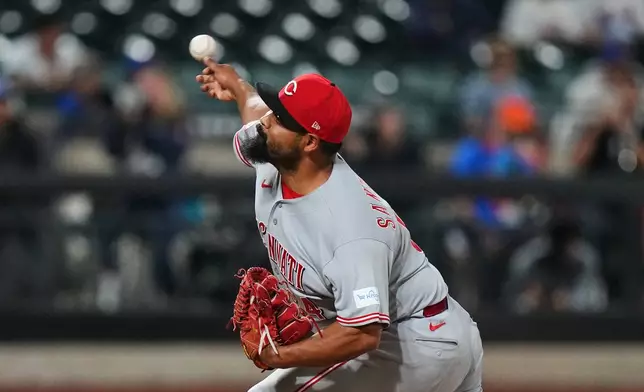 Cincinnati Reds' Tony Santillan pitches during the ninth inning of a baseball game against the New York Mets Tuesday, May 26, 2026, in New York. (AP Photo/Frank Franklin II)